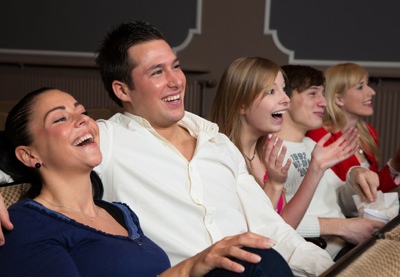 Photodune 4021253 laughing audience at the movies xs