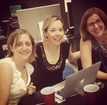 A weary trio consisting of Lynn Rae Julie Rustad and Heather Hiscox takes a break from planning a startup that will enable non-profits to create online wish lists