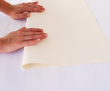 take a piece of paper and gently begin to bend it one way