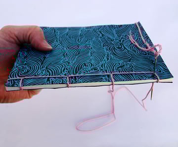 Sew down through hole 4 one last time