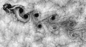 Kármán vortex street caused by wind flowing around the Juan Fernández Islands off the Chilean coast.