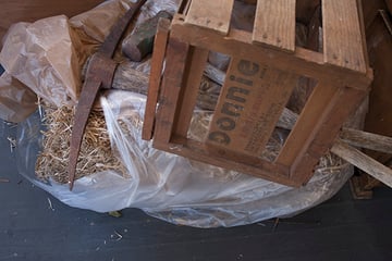 Cheap, evocative props. The crate is for melons, not wine, but that shouldn't matter from the right angle.
